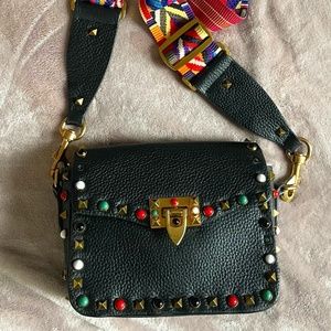 Black real leather handbag with studs